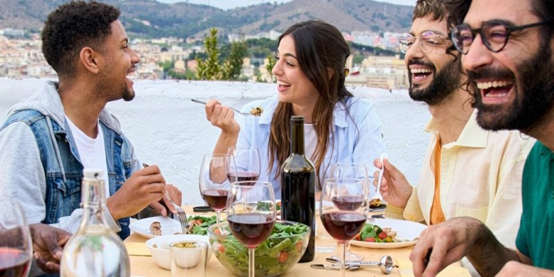 a woman enjoying a Mediterranean dinner